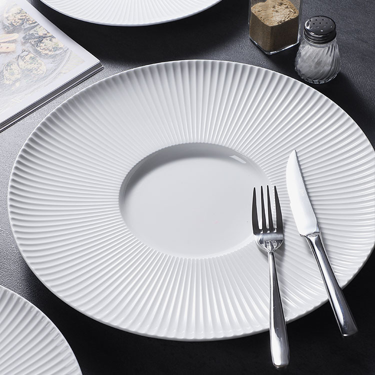 White porcelain round shallow plates