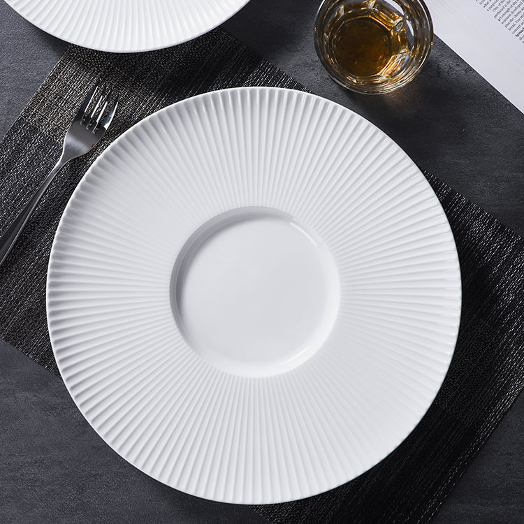 White porcelain round shallow plates