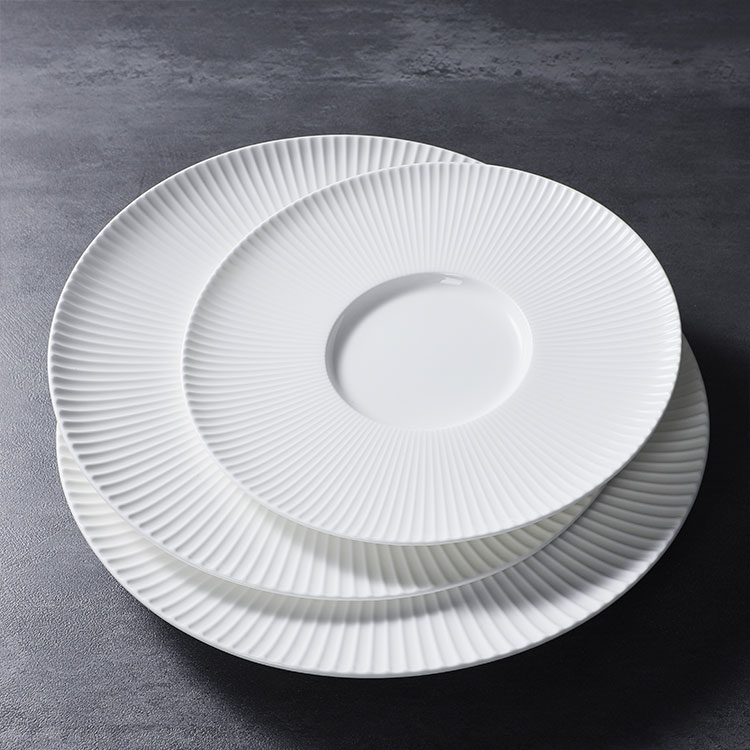 White porcelain round shallow plates