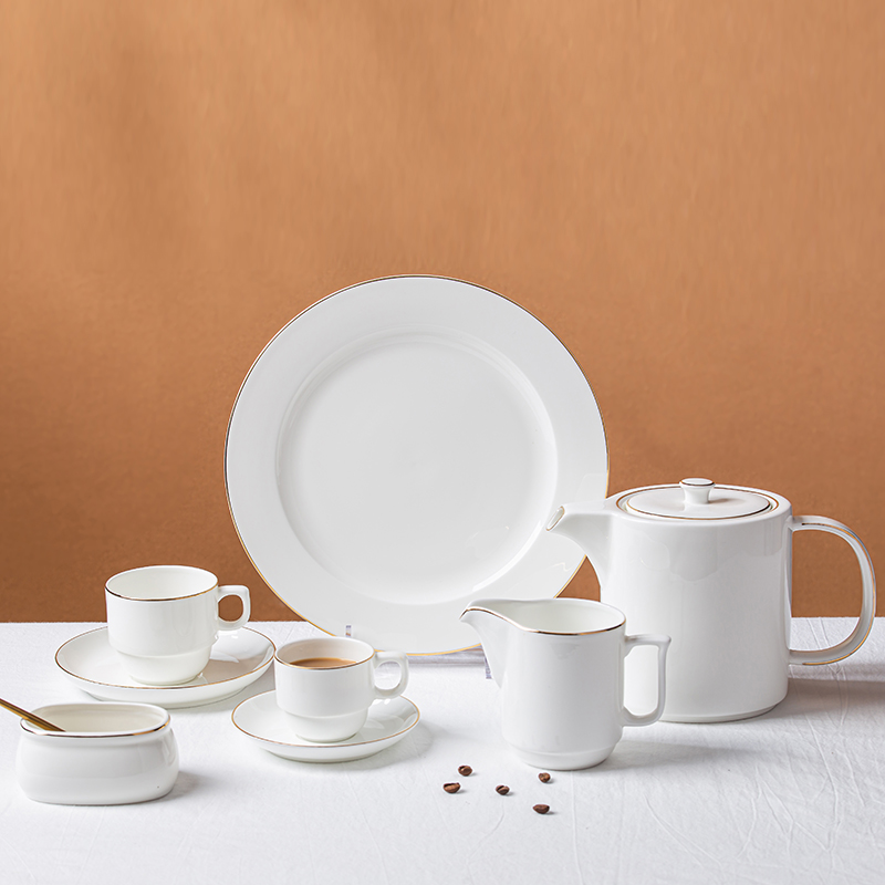 White tableware sets with gold rim