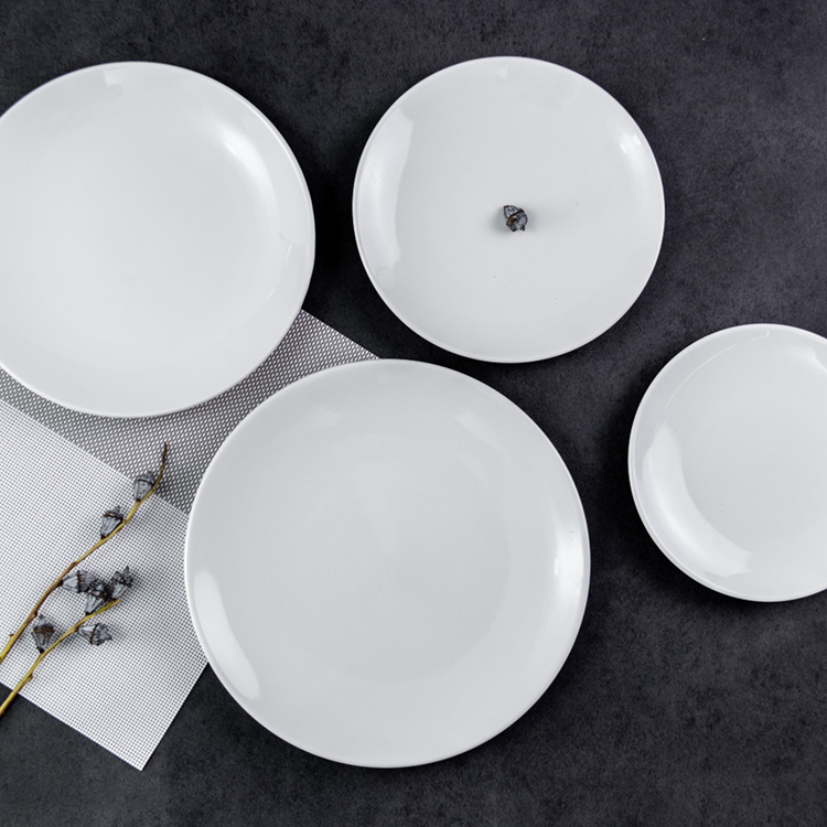 white ceramic charger plates