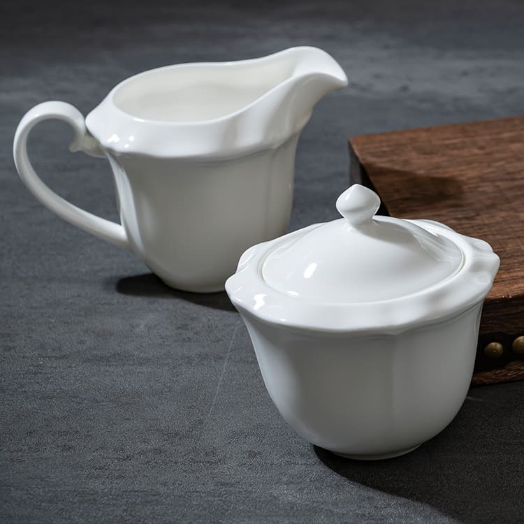 Elegance collection sugar container and creamer