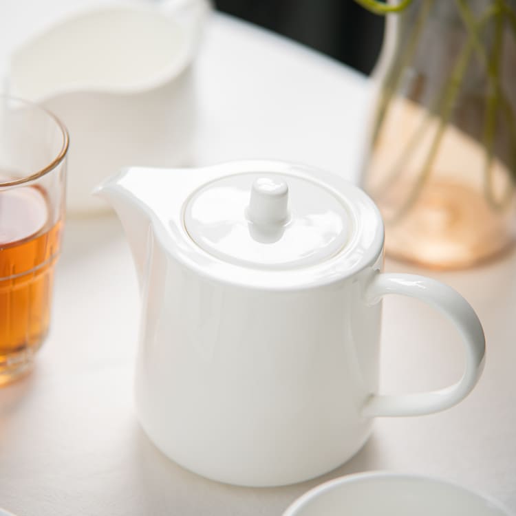 Fine Porcelain Teapot and Cup Set (2)